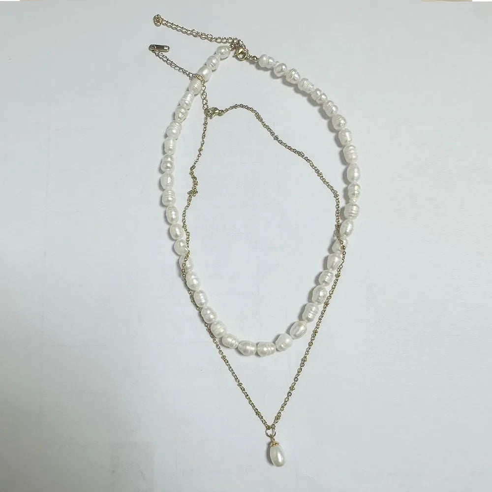 Stainless steel creative ball chain necklace for women, minimalist jewelry design featuring smooth, round beads.
