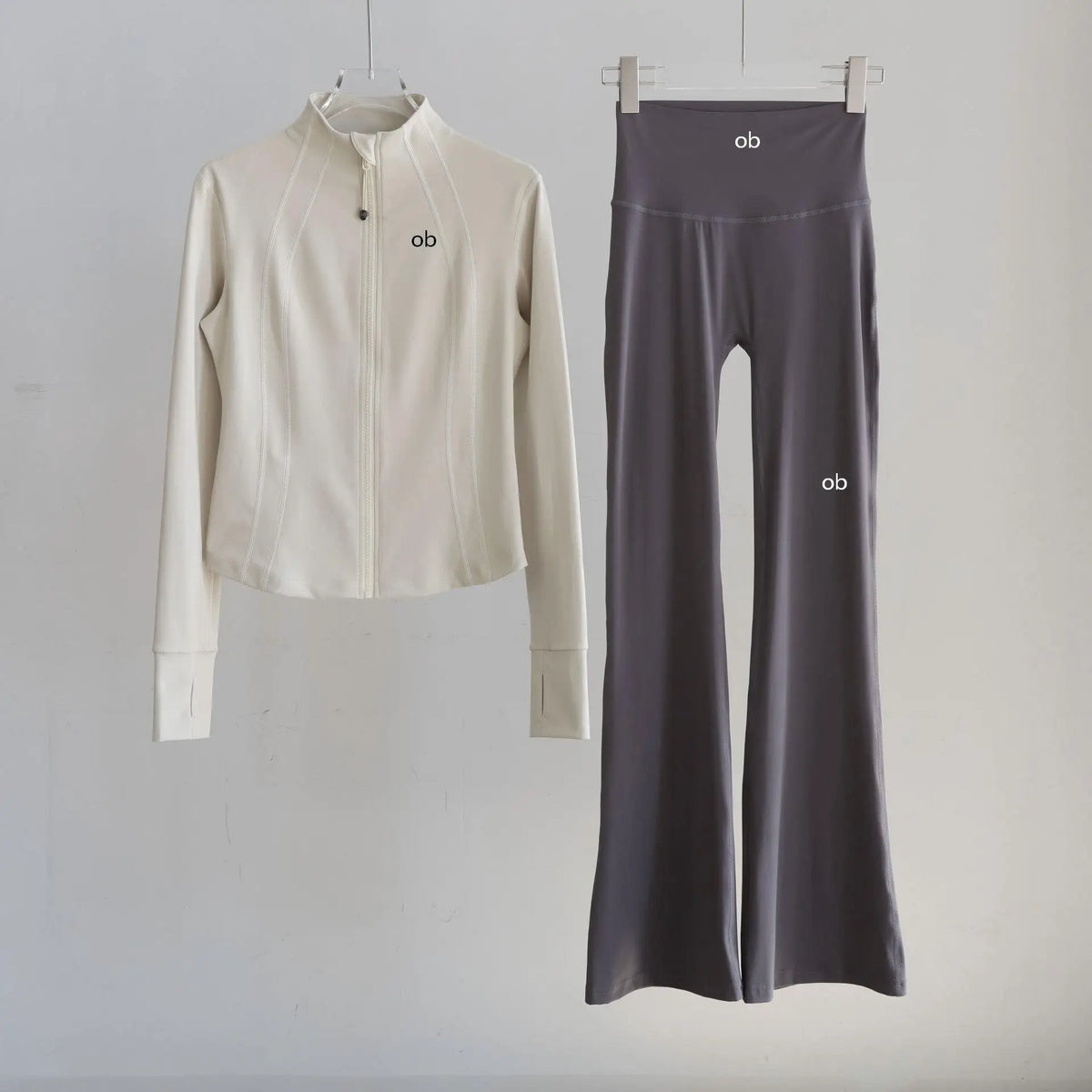 Sportswear for women - new trend in autumn with fitted stand-up collar for training, Pilates, fitness and hiking. Autumn/winter