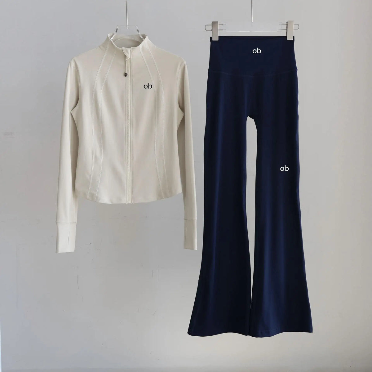 Sportswear for women - new trend in autumn with fitted stand-up collar for training, Pilates, fitness and hiking. Autumn/winter