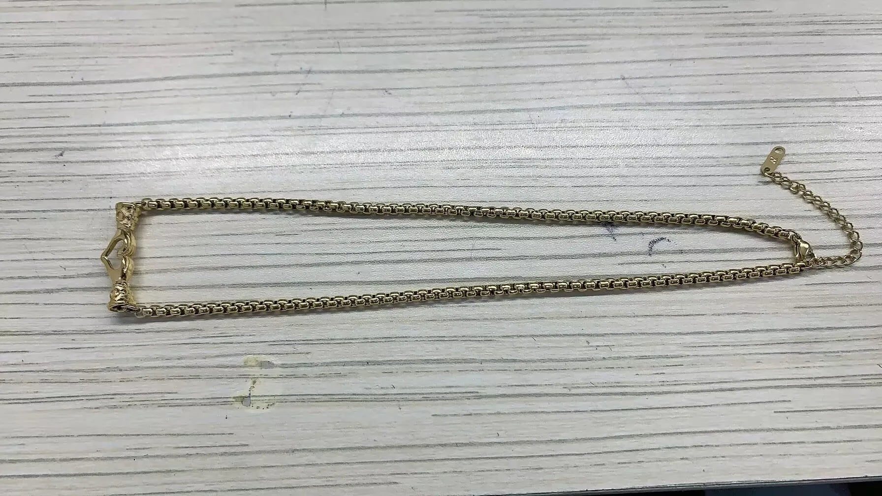 Stainless steel creative ball chain necklace for women, minimalist jewelry design with round ball links.