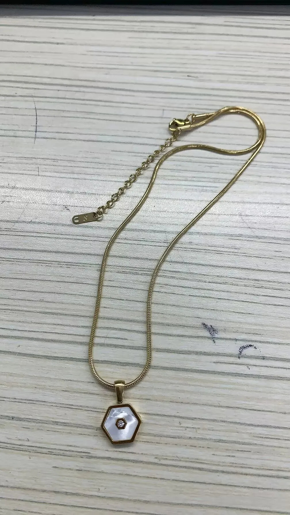 Stainless steel creative ball chain necklace for women, minimalist jewelry design with small round beads, stylish and modern accessory.