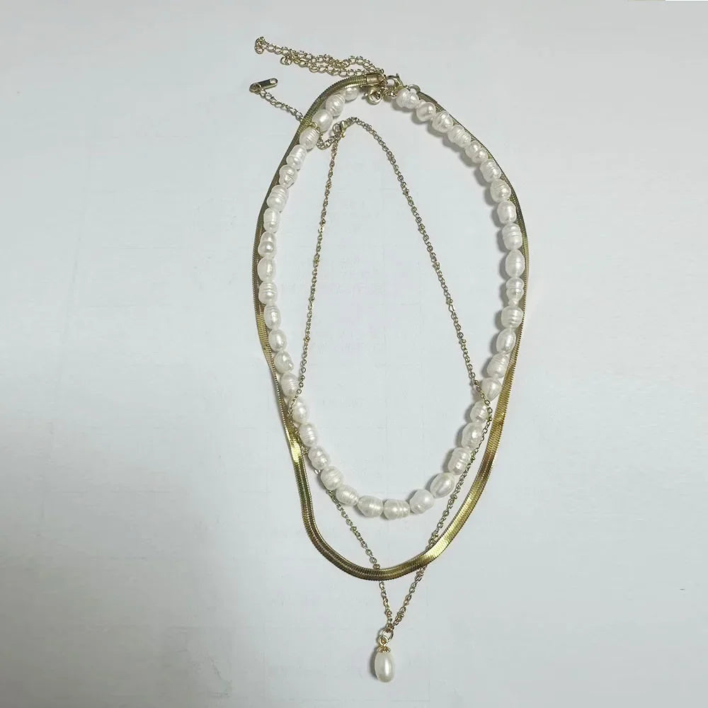 Stainless steel creative ball chain necklace for women, minimalist jewelry design featuring smooth, shiny metal balls.