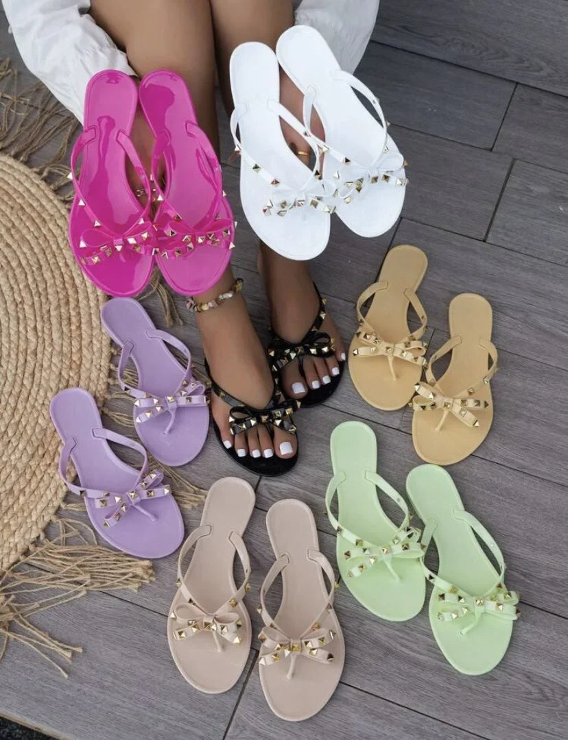 New Women's Flat Bottom Sandals Summer Rivet Butterfly Knot Slippers Slip-On Shoes PVC Material Comfortable Beach Footwear