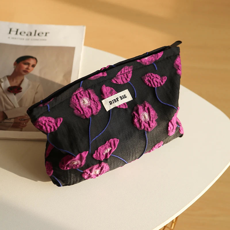 Purple Charm Women's makeup bag by Hotfashionitems, stylish cosmetic organizer pouch with zipper closure and compact design.