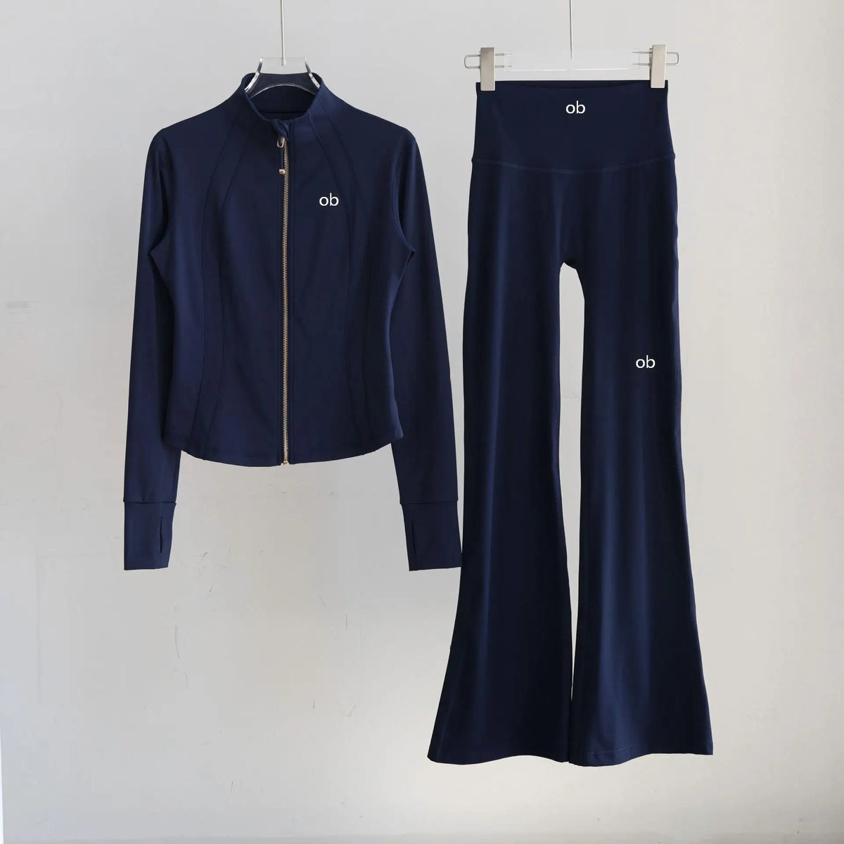 Sportswear for women - new trend in autumn with fitted stand-up collar for training, Pilates, fitness and hiking. Autumn/winter