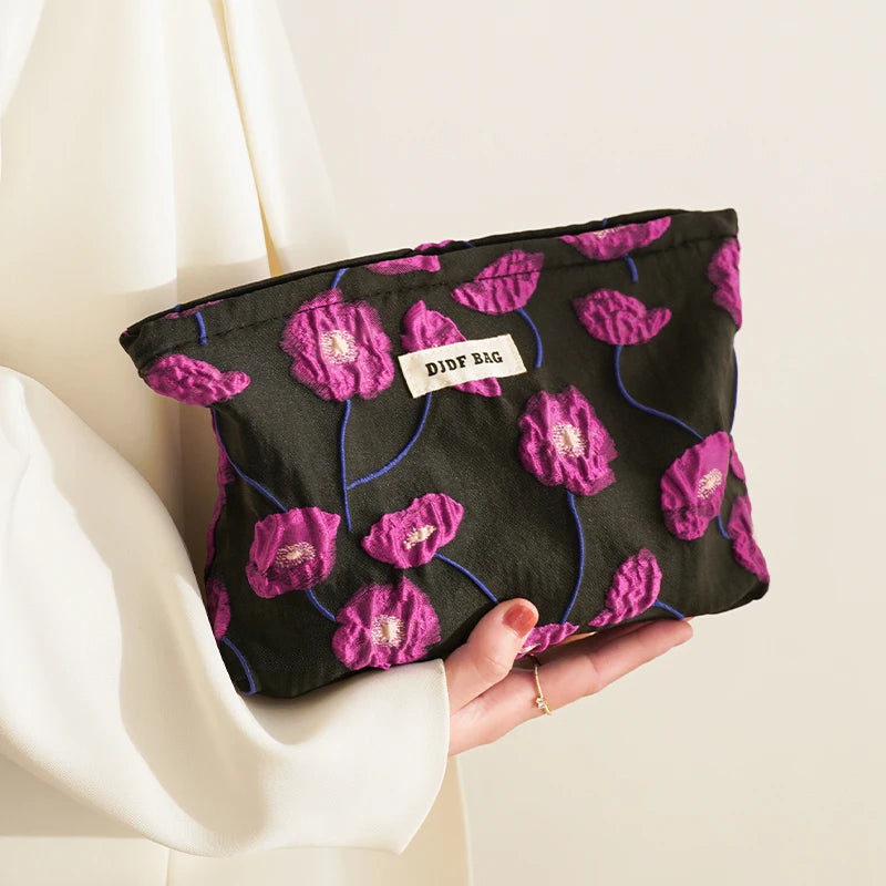 Purple Charm Women's Makeup Bag by Hotfashionitems, stylish cosmetic organizer pouch with a sleek design and compact size.